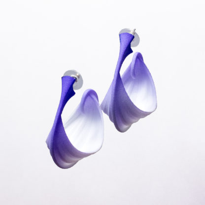 three quarter view of a pair of navicella ship in blue/violet/white